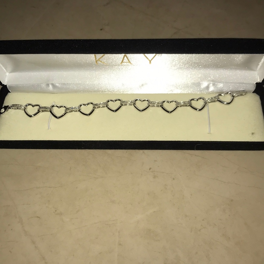 Beautiful silver heart bracelet with diamonds
